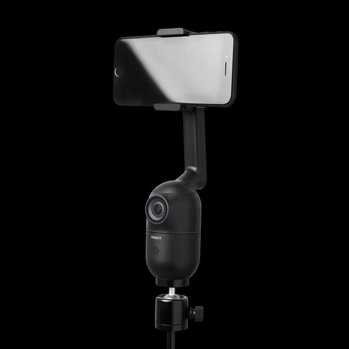 OBSBOT Me phone mount shown holding a phone on a support