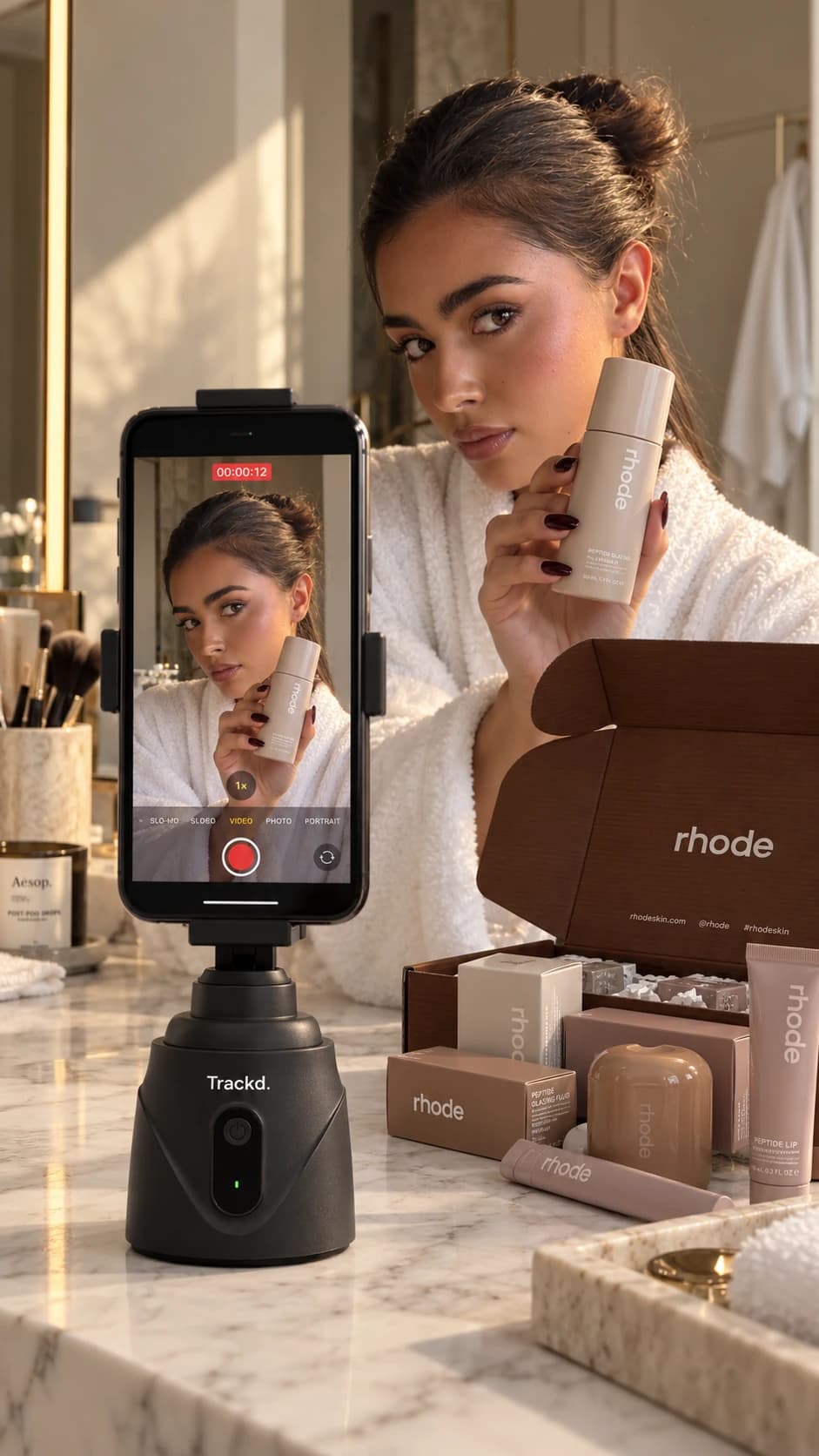 A creator presenting a skincare product with an iPhone on a Trackd Mount on the bathroom counter