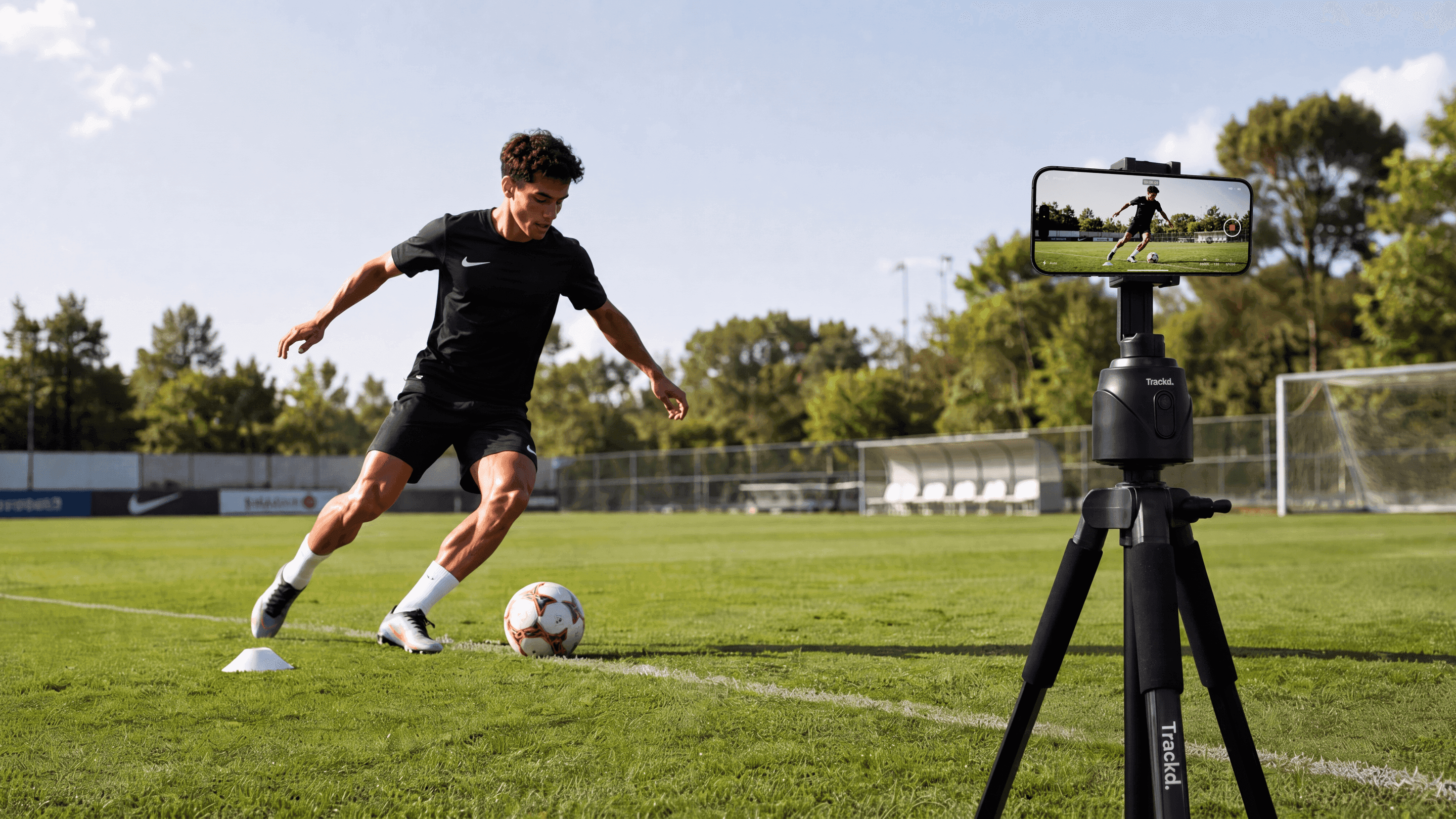 Trackd auto-tracking a footballer on a sunny field